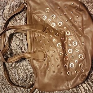 Large tan LaTique handbag.